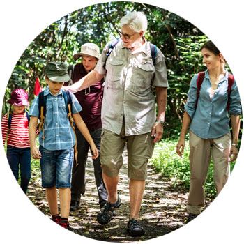 Family hiking on trails